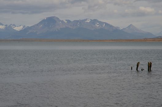 Ultima Esperanza Inlet and Sarmiento Mountain Range in the background from Puerto Natales. Ultima Esperanza Province. Magallanes and Chilean Antarctic Region. Chile.