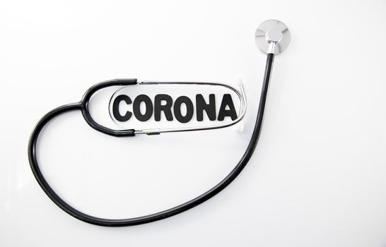 corona virus conceptual image with text in black om white and stethoscope