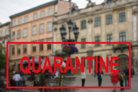 Warning text about a coronavirus outbreak in Ukraine against a blurred background of the ancient architecture of the Ukrainian city of Lviv. Coronavirus and quarantine for travel and tourism, pandemic covid-2019