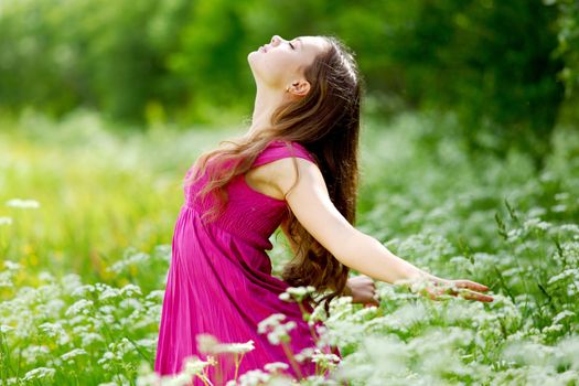 Woman outdoor feel natural freedom, summer flower meadow