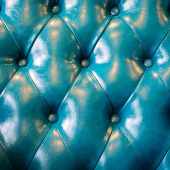 luxury blue genuine leather upholstery background, classic retro Chesterfield style