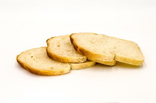 Wheat bread with bran slice. Cooking the dough. Isolated on white background.