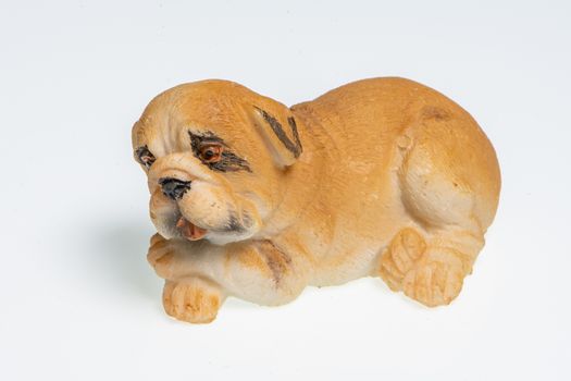 Miniature depicting an English Bulldog breed dog on a white background