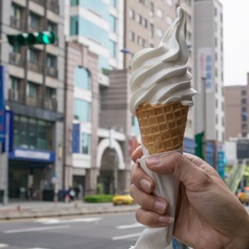 The delicious ice cream cone on hand at street in Taipei city, Taiwan.