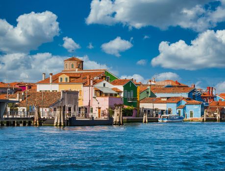 Many colored buildings on the coast of Burano near Venice, Italy