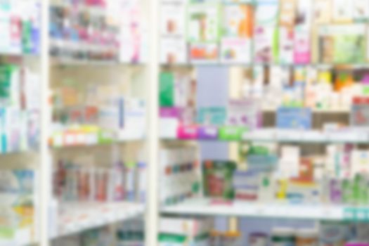 Pharmacy drugstore counter with medicine and vitamin supplement on shelves blur abstract background for montage healthcare product display