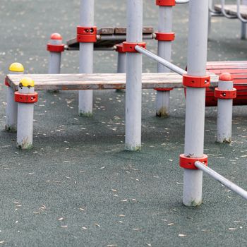 An empty modern Playground with climbing ladders on a bright Sunny spring day. An ideal place for children's outdoor activities.