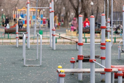 An empty modern Playground with climbing ladders on a bright Sunny spring day. An ideal place for children's outdoor activities.