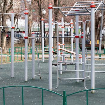 An empty modern Playground with climbing ladders on a bright Sunny spring day. An ideal place for children's outdoor activities.