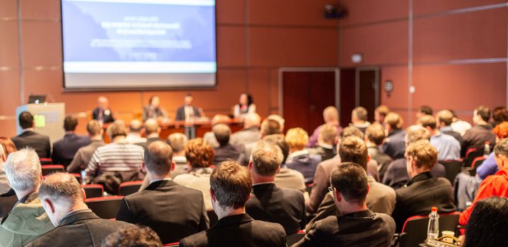 Round table discussion at business convention and Presentation. Audience at the conference hall. Business and entrepreneurship symposium.