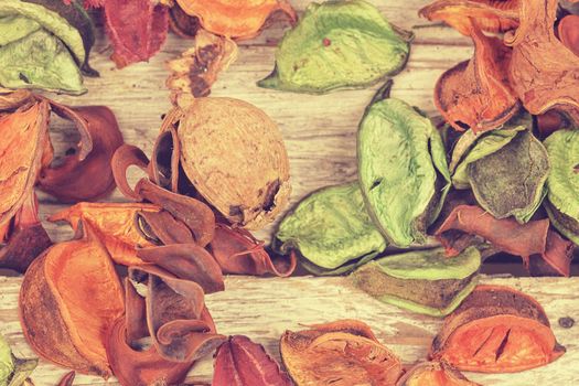 Potpourri. Close-up of dried flowers, used for aromatherapy, white background. Top view