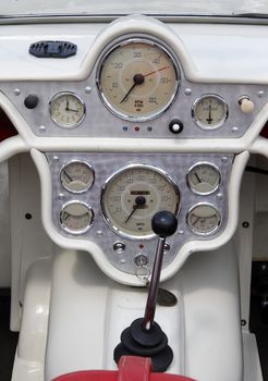 Oldtimer dashboard of a classic car from the 1960's.