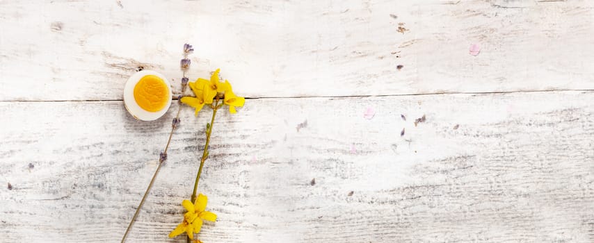 yellow flowers on white wood board with copy space