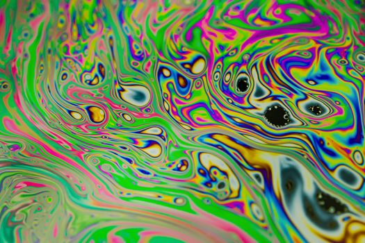 Close up soap bubble background. Psychedelic abstract background