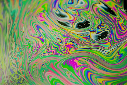 Close up soap bubble background. Psychedelic abstract background