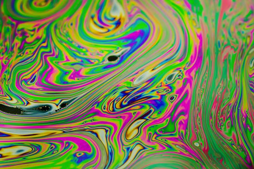 Close up soap bubble background. Psychedelic abstract background