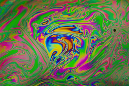 Close up soap bubble background. Psychedelic abstract background