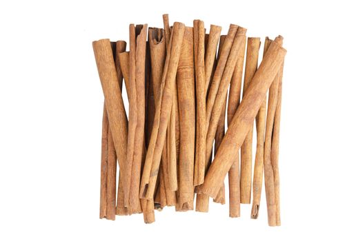 Cinnamon sticks top view isolated on white background with clipping path
