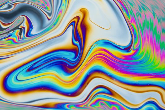 Psychedelic multicolored patterns background. Photo macro shot of soap bubbles