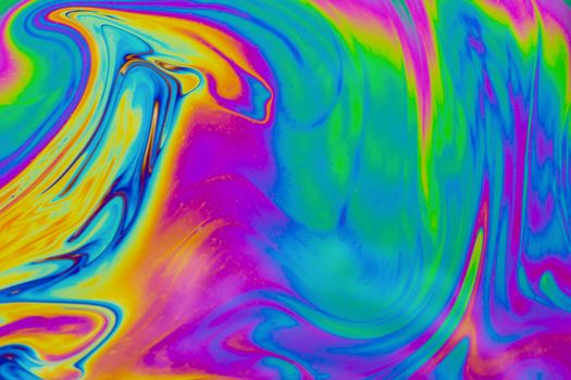 Psychedelic multicolored patterns background. Photo macro shot of soap bubbles