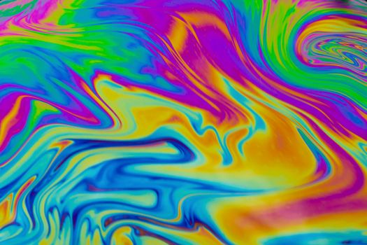 Psychedelic multicolored patterns background. Photo macro shot of soap bubbles
