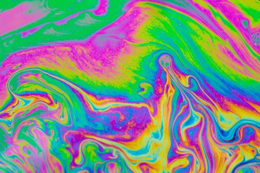 Psychedelic multicolored patterns background. Photo macro shot of soap bubbles