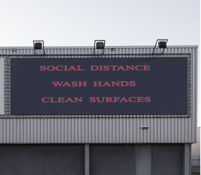 Bus station board billboard with three basic rules to avoid the coronavirus or Covid-19 epidemic of wash hands, maintain social distance and clean surfaces