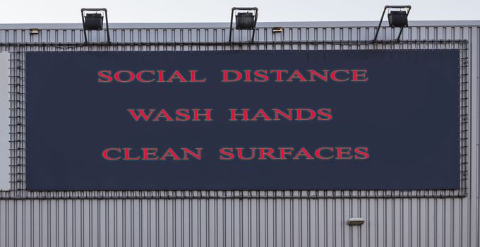 Bus station board billboard with three basic rules to avoid the coronavirus or Covid-19 epidemic of wash hands, maintain social distance and clean surfaces