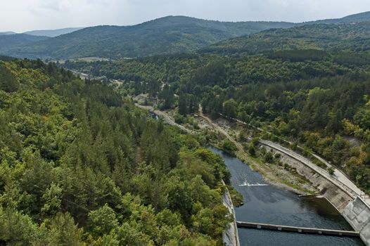 View of the old small hydro power plant and Topolnitsa dam  on the river Topolnitsa near village Muhovo, Ihtiman region, Bulgaria, Europe