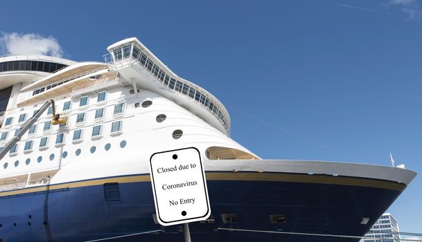 cruiseship with blue sky background waiting in the harbour for the next trip