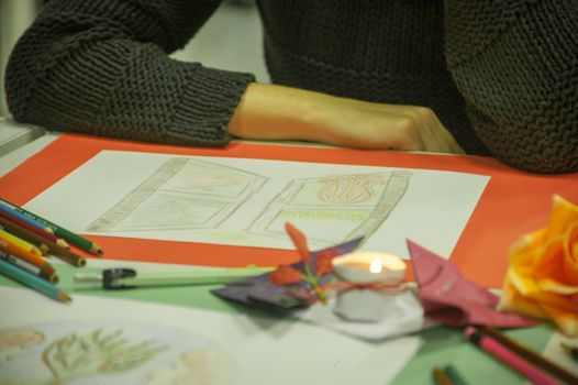 LUSIA, ITALY 23 MARCH 2020: Art Therapy school with people who draw and color their drawings for therapeutic purposes