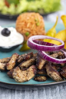 greek gyros on a plate with fries