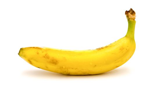 Well yellow banana on a white background