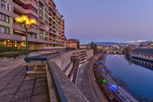 Rhone river and old buildings by sunset, Geneva, Switzerland - HDR