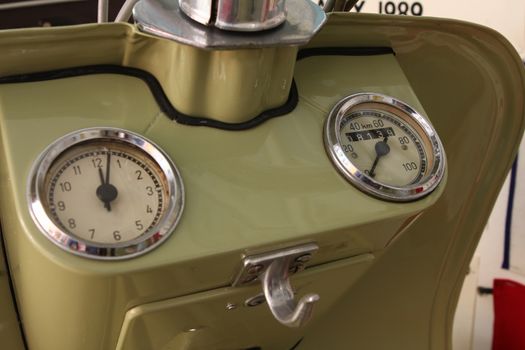 Old biker helmet and goggles. close up of dashboards