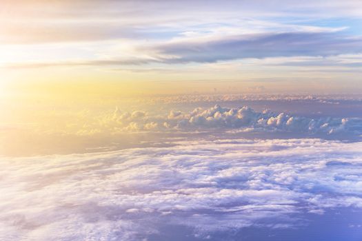 dramatic and spiritual cloudscape with dramatic clouds reflecting the rays of sunset light.