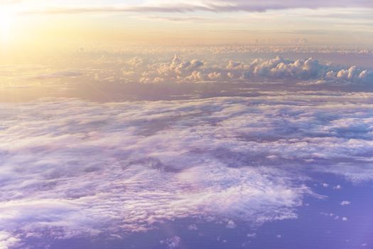 dramatic and spiritual cloudscape with dramatic clouds reflecting the rays of sunset light.