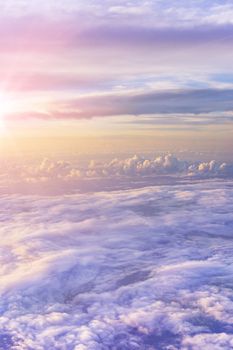 dramatic and spiritual cloudscape with dramatic clouds reflecting the rays of sunset light.