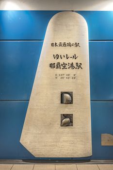 Commemorative monument for the japan eastern station of Yui Rail in the Naha Airport Station entrance in the island of Okinawa in Japan.