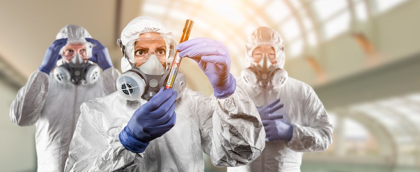 Team of Doctors or Nurses In Hazmat Gear Holding Positive Coronavirus Test Tube Banner.