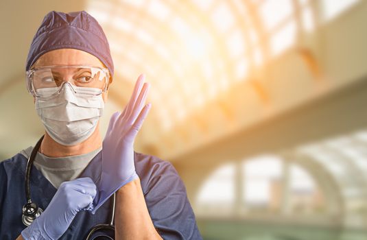 Female Doctor or Nurse Wearing Protective Face Mask and Surgical Gloves In Hospital.