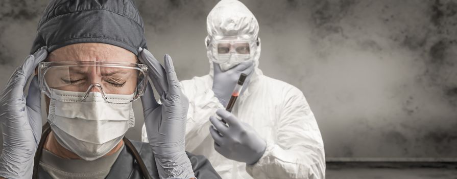 Female and Male Doctors or Nurses Wearing Scrubs and Protective Mask and Goggles Banner.