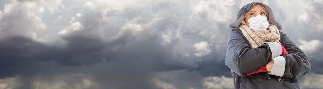 Woman Wearing Medical Face Mask and Jacket In Cloudy Stormy Weather Banner.