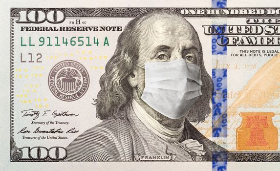 One Hundred Dollar Bill With Medical Face Mask on Face of Benjamin Franklin.