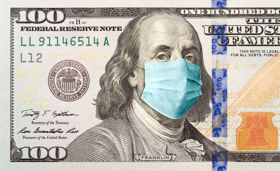 One Hundred Dollar Bill With Medical Face Mask on Benjamin Franklin.