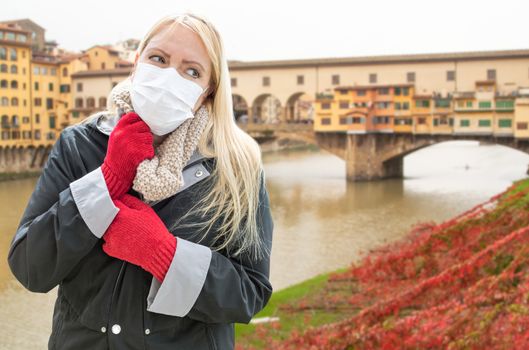 Young Woman Wearing Face Mask Walks the Streets In Tuscany, Florence, Italy.