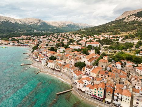 Aerial panoramic view of Baska town, popular touristic destination on island Krk, Croatia, Europe.