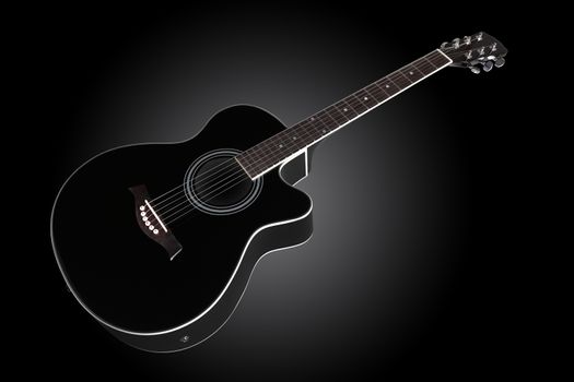 A guitar inclined on dark graduated background with copy space