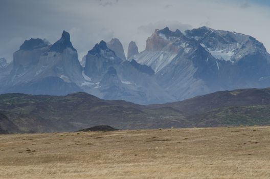 Paine Mountain Range with the Paine Horns and Towers of Paine. Torres del Paine National Park. Ultima Esperanza Province. Magallanes and Chilean Antarctic Region. Chile.