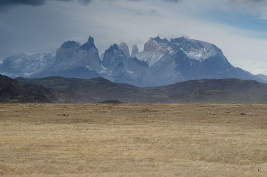 Paine Mountain Range with the Paine Horns and Towers of Paine. Torres del Paine National Park. Ultima Esperanza Province. Magallanes and Chilean Antarctic Region. Chile.